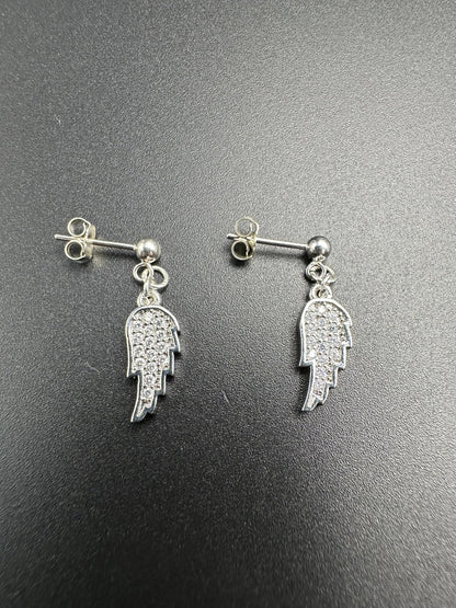 Mes Cajoux boucles d’oreilles Boules en argent massif et ses breloques ailes d’ange argentées elles mesure et de 2,5 cm