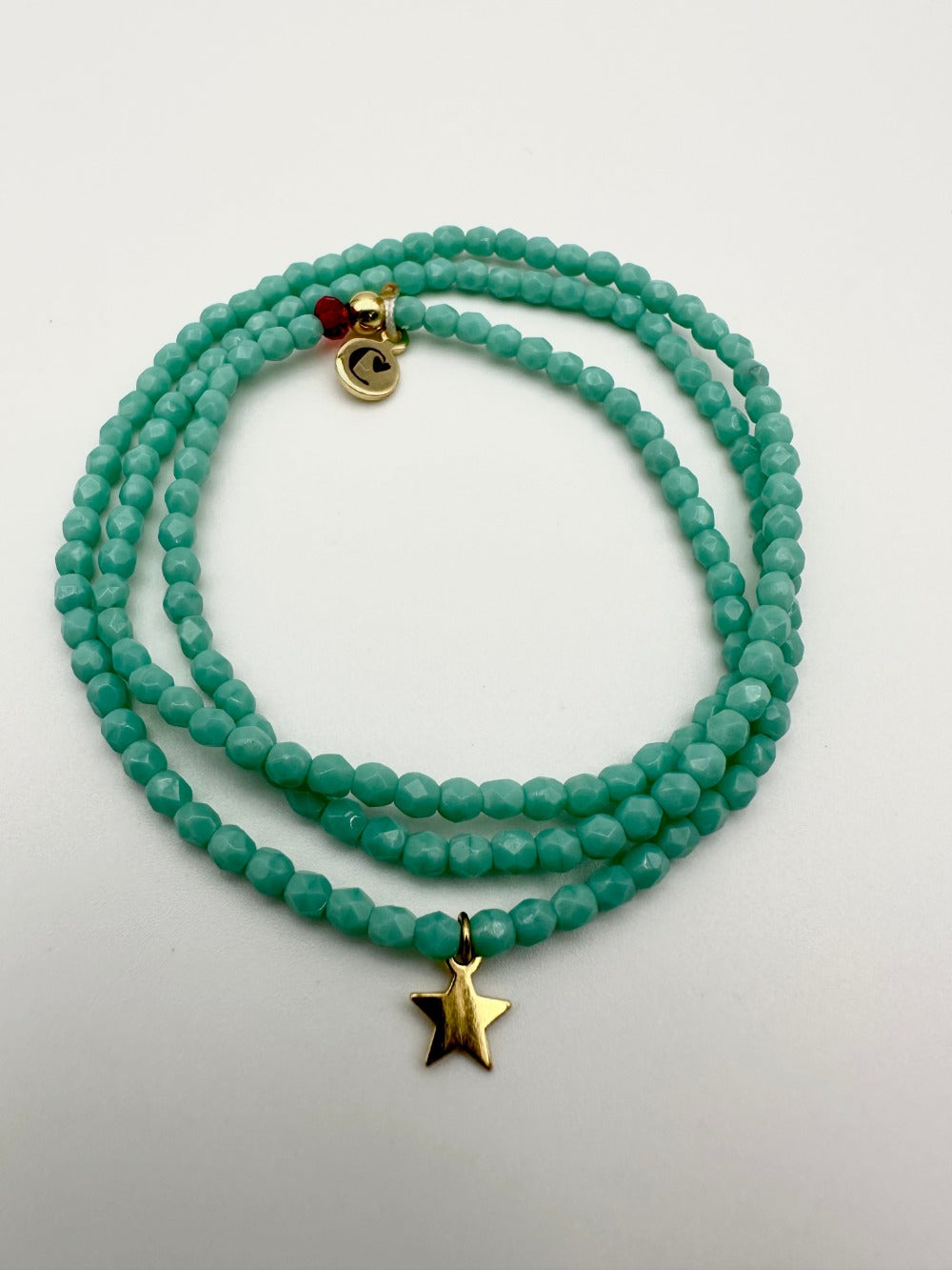 Mon Cajoux 2 en 1 en facettes de bohèmes turquoise et ça petite breloque étoile doré à l’or fin