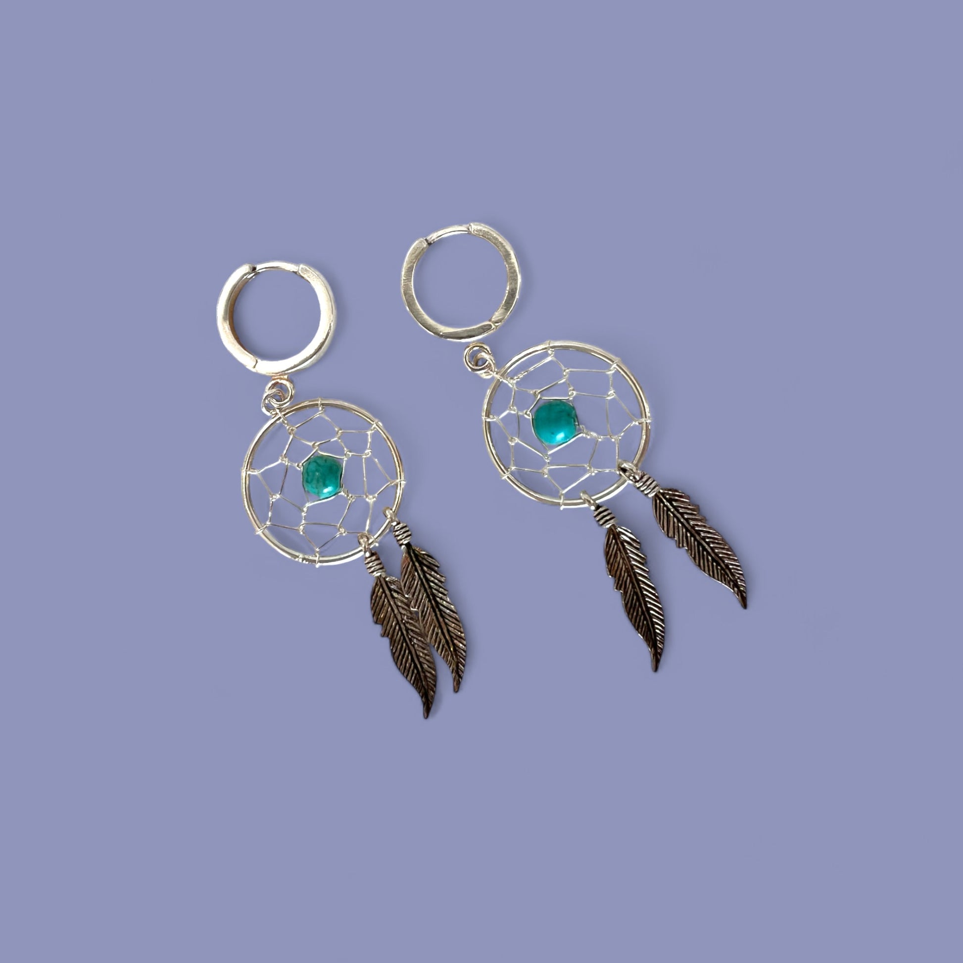 Les boucles de Ray de bijoux cajou attrape-rêves avec sa perle en turquoise