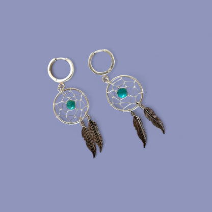 Les boucles de Ray de bijoux cajou attrape-rêves avec sa perle en turquoise